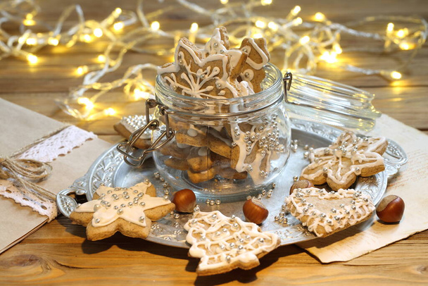Gingerbread Cookie with Christmas Garland Lights - Zdjęcie, obraz