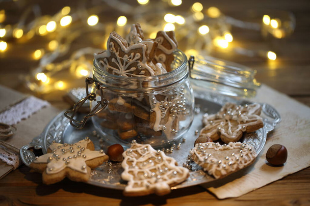 Gingerbread Cookie with Christmas Garland Lights - Zdjęcie, obraz