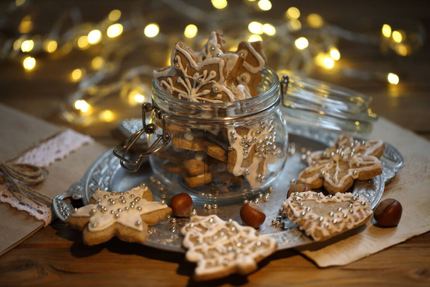 Gingerbread Cookie with Christmas Garland Lights - Fotoğraf, Görsel