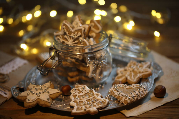 Gingerbread Cookie with Christmas Garland Lights - Photo, Image