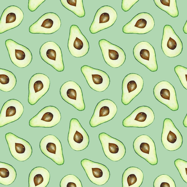Watercolor avocado fruits on the light green background. Seamless pattern - Фото, зображення