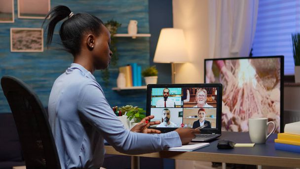 Black businesswoman on video conference working remotely - Foto, imagen