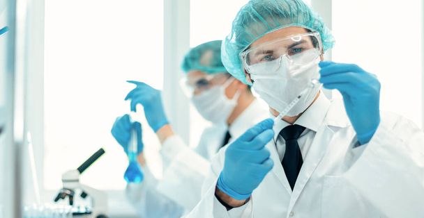 background image of a laboratory assistant in a medical laboratory - Zdjęcie, obraz