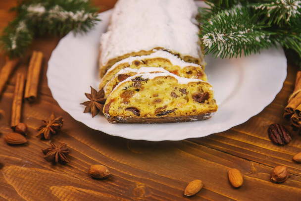 christmas stollen on wooden background. selective focus.holoday - Photo, Image