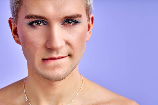 sexy gay want to be loved. he bites lips and look at camera - 写真・画像