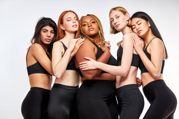 plus size and skinny models stand together - Photo, Image