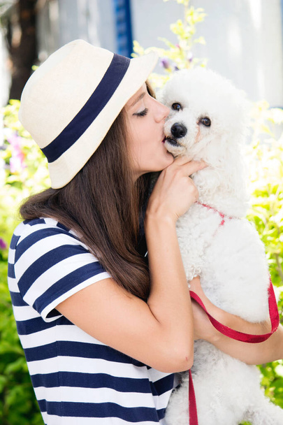 kisses dog and girl - Photo, Image
