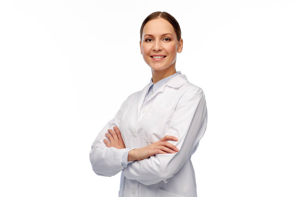 happy smiling female doctor in white coat - 写真・画像