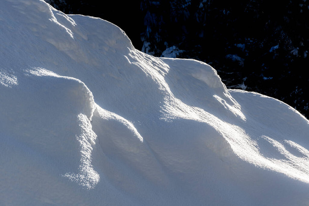 snowdrifts on a slope - Photo, image