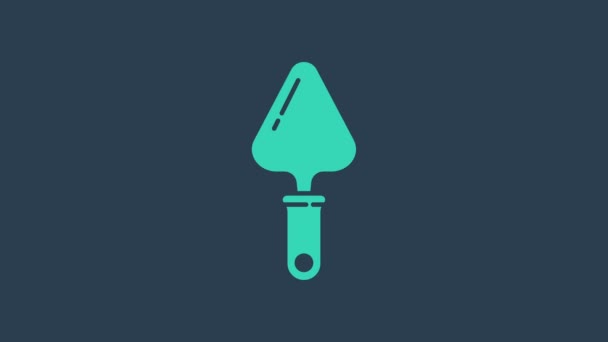 Turquoise Trowel icon isolated on blue background. 4K Video motion graphic animation - Footage, Video