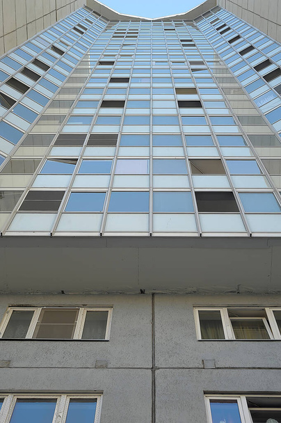 multi-storey building with many windows upward view - 写真・画像