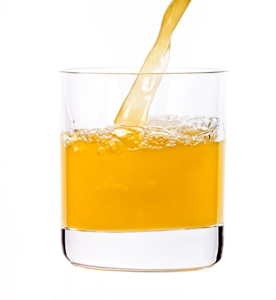 Juice pouring into the glass - Photo, Image