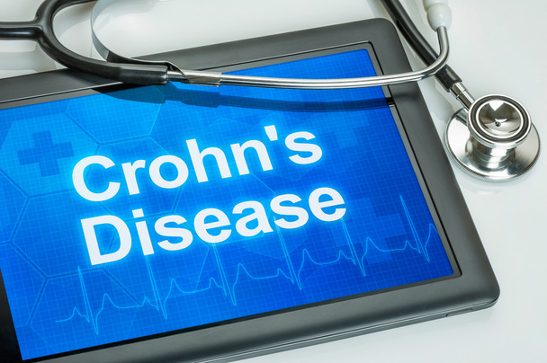 Tableta con el diagnóstico Enfermedad de Crohn en la pantalla - Foto, Imagen