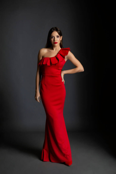 Beautiful black hair woman posing in red dress - Zdjęcie, obraz