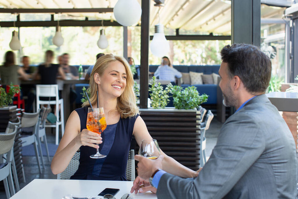 Business couple flirting in the cafe bar - Photo, image