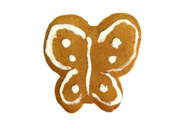 Lebkuchen-Schmetterling Hand isoliert auf Weiß gemalt - Foto, Bild