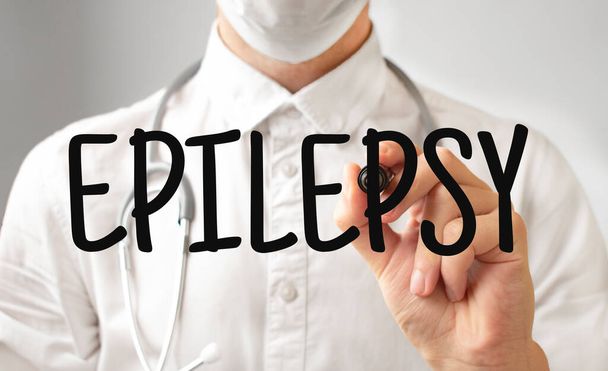 Doctor writing word EPILEPSY with marker, Medical concept - Foto, Imagen