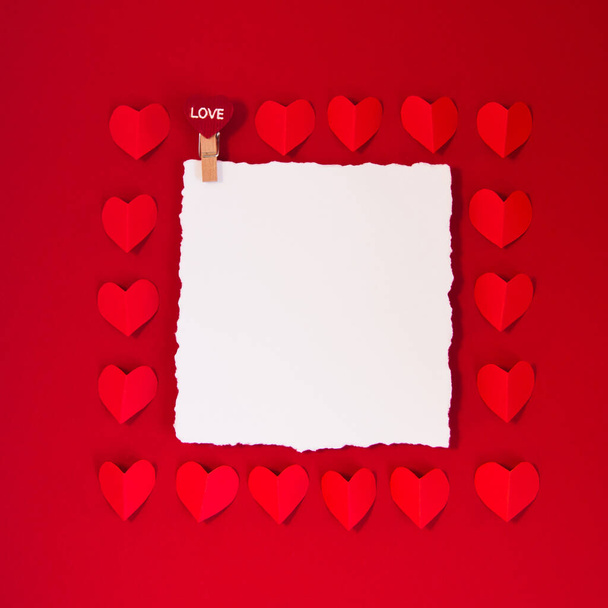 Card for text on red background and hearts red, concept Valentine's day wedding greeting, copy space - Fotografie, Obrázek