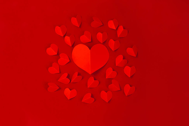 Valentine's Day concept with red hearts on red background,  Flat lay, copy space - Fotoğraf, Görsel