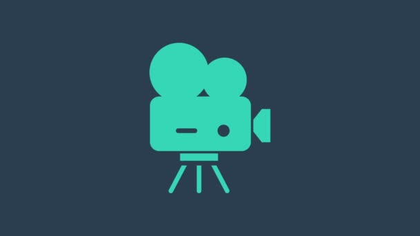 Türkis Retro-Kino-Kamera-Symbol isoliert auf blauem Hintergrund. Videokamera. Filmschild. Filmprojektor. 4K Video Motion Grafik Animation - Filmmaterial, Video