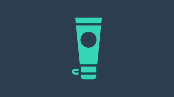 Türkiz krém vagy testápoló kozmetikai cső ikon elszigetelt kék alapon. Testápolási termékek férfiaknak. 4K Videó mozgás grafikus animáció - Felvétel, videó