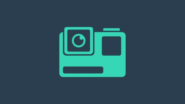 Tyrkysová Akční extrémní ikona kamery izolované na modrém pozadí. Videokamera zařízení pro natáčení extrémních sportů. Grafická animace pohybu videa 4K - Záběry, video