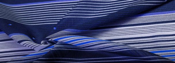 tela de seda, fondo azul con patrón de rayas de líneas blancas y moradas, tema mexicano, trajes de poncho mexicano. Patrón de textura, colección, - Foto, Imagen