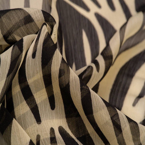 silk fabric with black and beige stripes, zebra skin in African style. For the designer, the sketch of the layout, the entourage of the decorator. Background texture collection - Photo, Image
