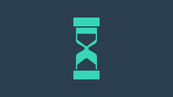 Tyrkysová Staré přesýpací hodiny s tekoucí pískovou ikonou izolované na modrém pozadí. Pískové hodiny. Obchodní a časová koncepce. Grafická animace pohybu videa 4K - Záběry, video