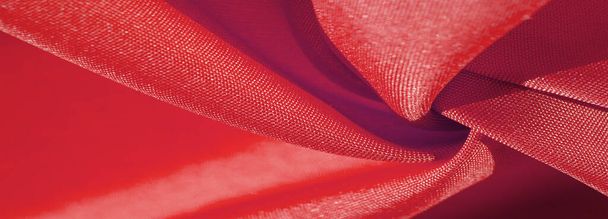 Шелковая ткань рубиново-красная. текстура цветной шелковой ткани - может быть использована в качестве фона - Фото, изображение