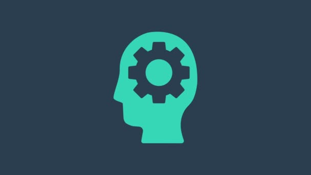 Tête humaine turquoise avec des engins à l'intérieur icône isolée sur fond bleu. Intelligence artificielle. Un cerveau pensant. Travail symbolique du cerveau. Animation graphique de mouvement vidéo 4K - Séquence, vidéo