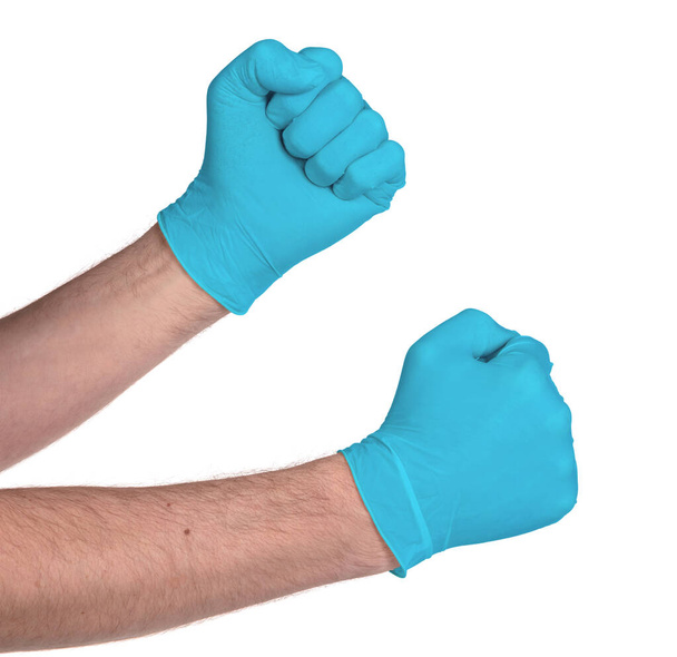 Latex handschoen geïsoleerd op witte achtergrond - Medische apparatuur, beschermende handschoenen - Foto, afbeelding
