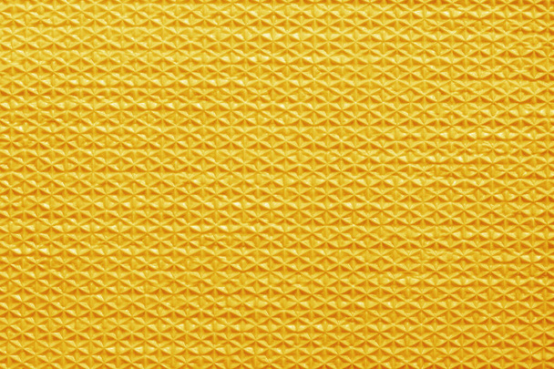 Žlutá guma textura pozadí s hladkým vzorem. - Fotografie, Obrázek