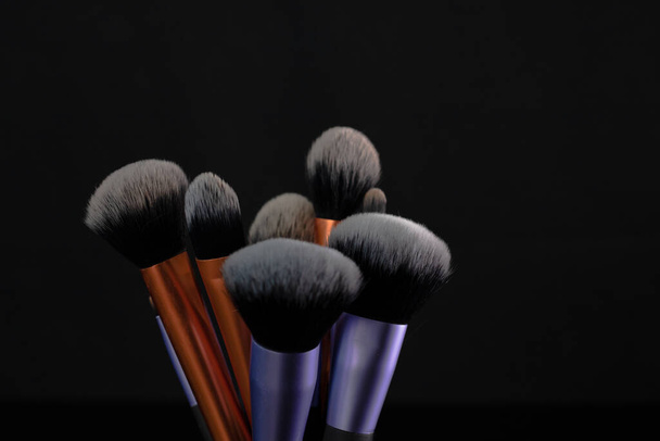 Clean and dirty professional makeup brushes isolated. - Photo, Image