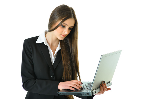Business Woman Standing and Typing on Laptop - Fotó, kép