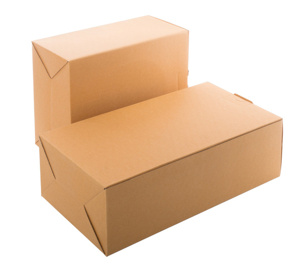 Closed cardboard boxes isolated over white background - Photo, image