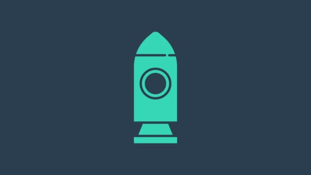 Tyrkysová ikona raketové lodi izolovaná na modrém pozadí. Vesmírné cestování. Grafická animace pohybu videa 4K - Záběry, video