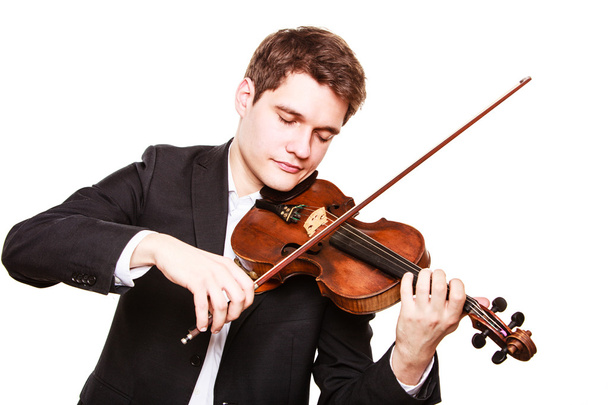 Man violinist playing violin. Classical music art - Φωτογραφία, εικόνα