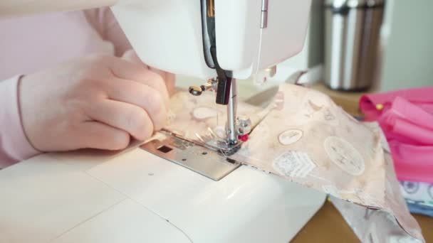 Sewing cotton face mask with a sewing machine for coronavirus outbreak. - Footage, Video