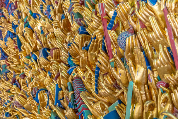 Η χιλιάδες χέρι οπτικοακουστικό εικόνα στο dazu ροκ γλυπτά σε chongqing, Κίνα  - Φωτογραφία, εικόνα