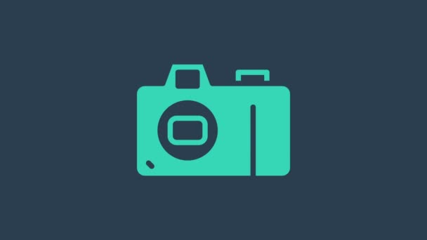 Icono de la cámara fotográfica turquesa aislado sobre fondo azul. Icono de cámara fotográfica. Animación gráfica de vídeo 4K - Metraje, vídeo