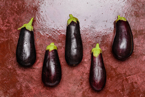 Fresh eggplants on color background - Zdjęcie, obraz