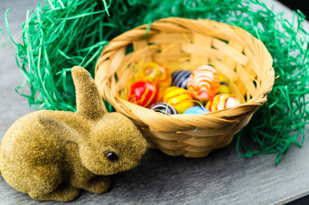Happy Easter Rabbits and colored eggs - Photo, Image