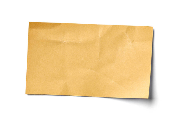 close-up van een nota papier op witte achtergrond - Foto, afbeelding