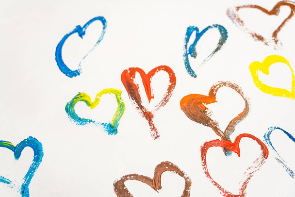 Hearts painted with paints on a white background. Love concept - Фото, изображение