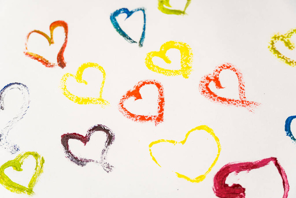 Valentine's Day card made from hearts painted with paints on a white background. Love concept - Foto, imagen