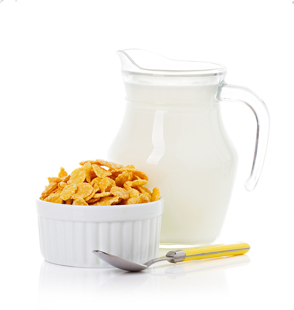 Сніданок з кукурудзяними пластівцями та молоком
 - Фото, зображення