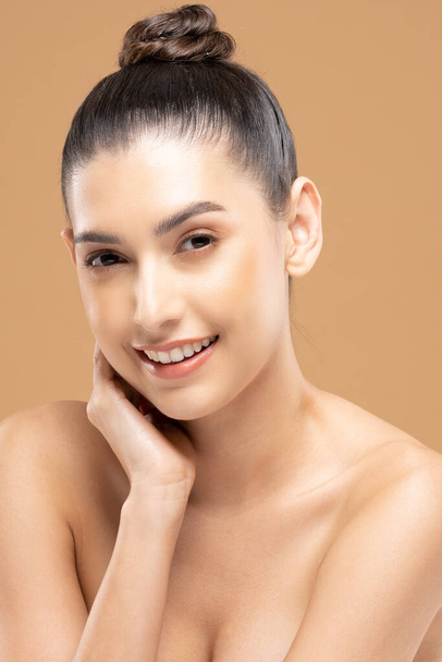 Beautiful Glamour woman touching cheek smile with clean and fresh skin Happiness and cheerful with positive emotional,isolated on Beige background,Beauty Cosmetics and spa Facial treatment Concept - 写真・画像