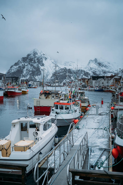 Snowy fishing port in Norway - Foto, afbeelding