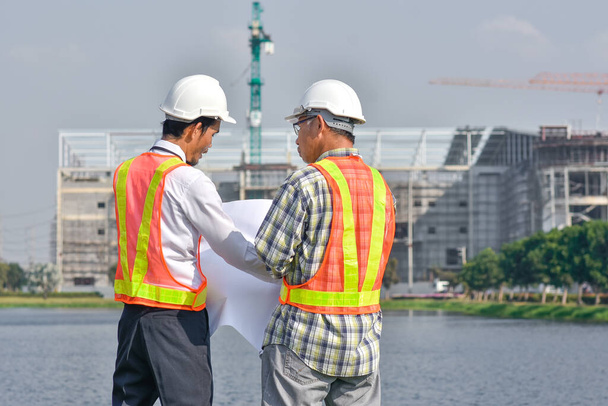 Engineer team shake hand on site construction - Foto, afbeelding